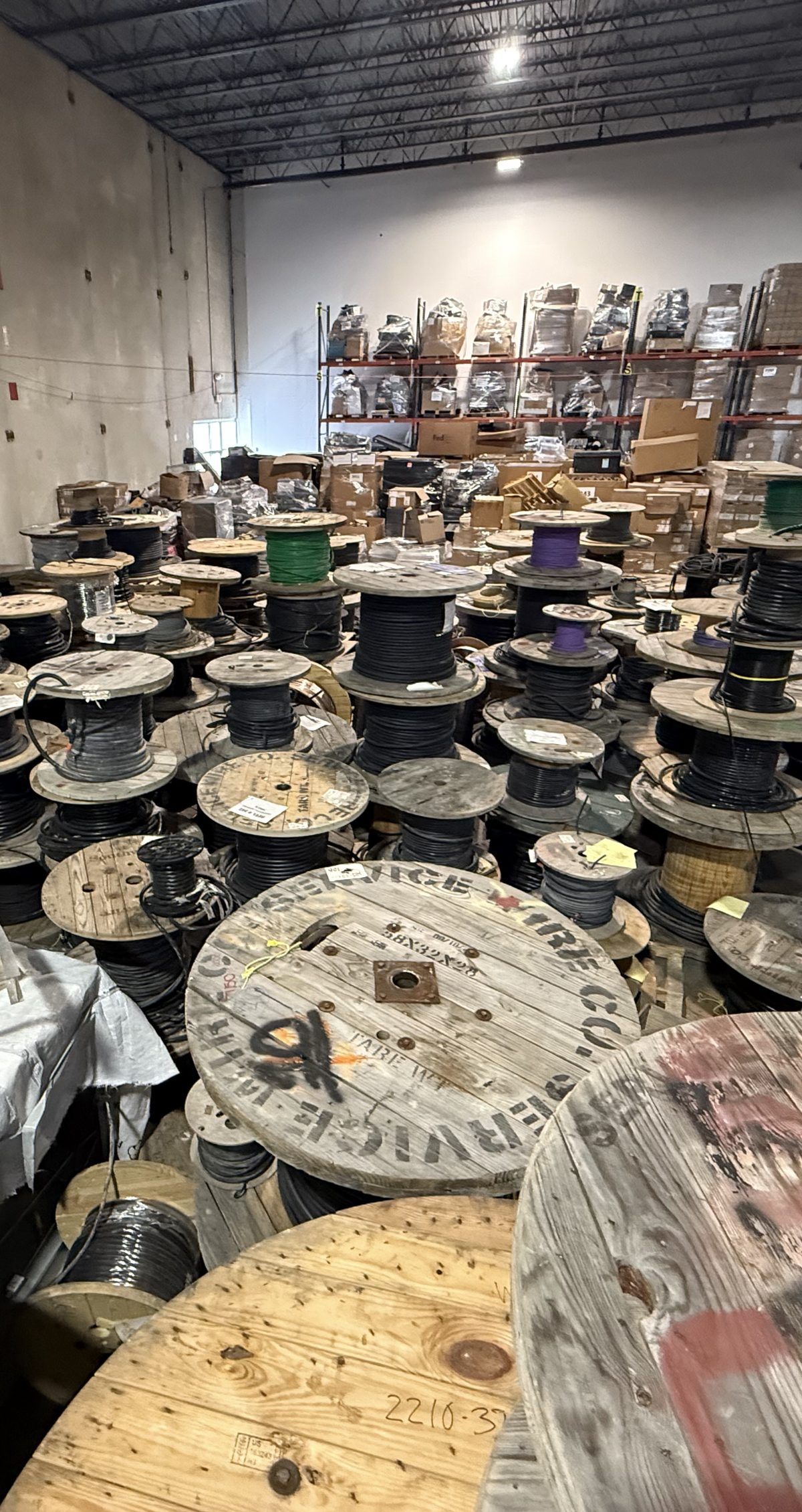 Wire spools shelved in a warehouse