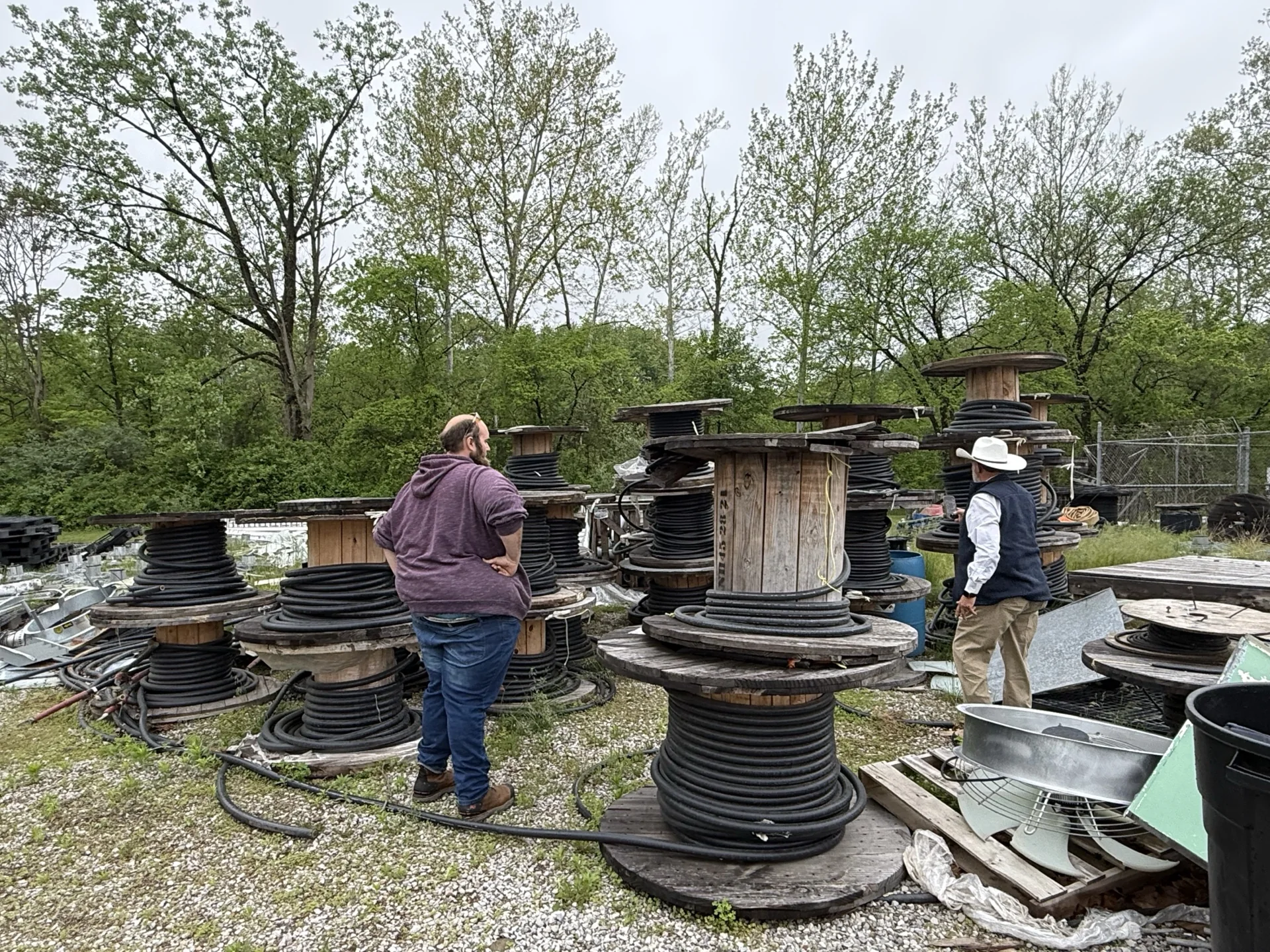 Industrial wire reels staged in an equipment yard